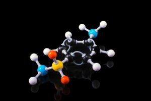 Molecular model of a peptide structure with colorful spheres representing different elements