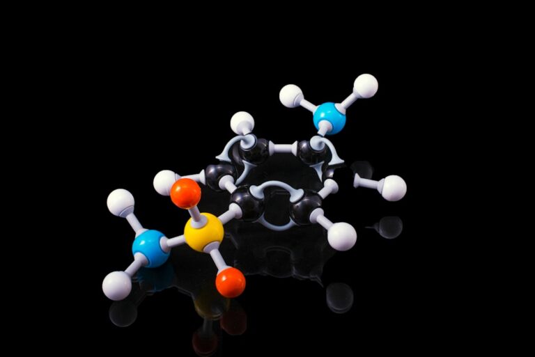 Molecular model of a peptide structure with colorful spheres representing different elements