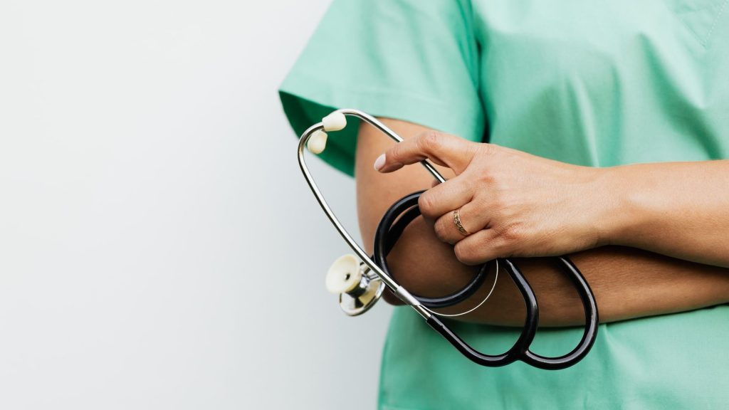 Close-up of a healthcare worker holding a stethoscope, showcasing medical professionalism. — Nutritional Powerhouses: Healthy