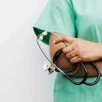 Close-up of a healthcare worker holding a stethoscope, showcasing medical professionalism. — Nutritional Powerhouses: Healthy